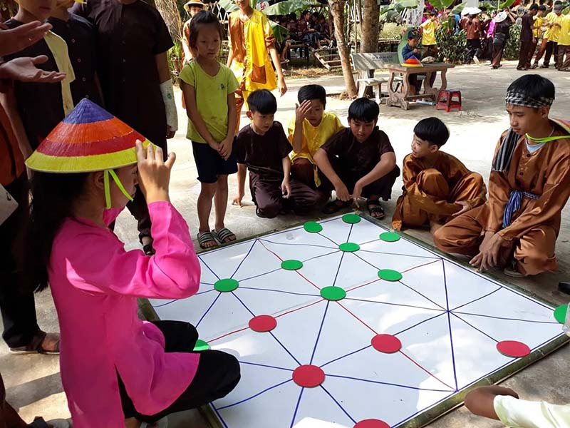 Hướng dẫn cách tổ chức trò chơi cờ gánh cho trẻ em